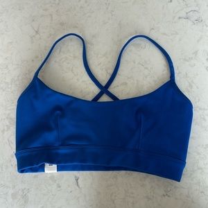 The giving movement royal blue sports bra